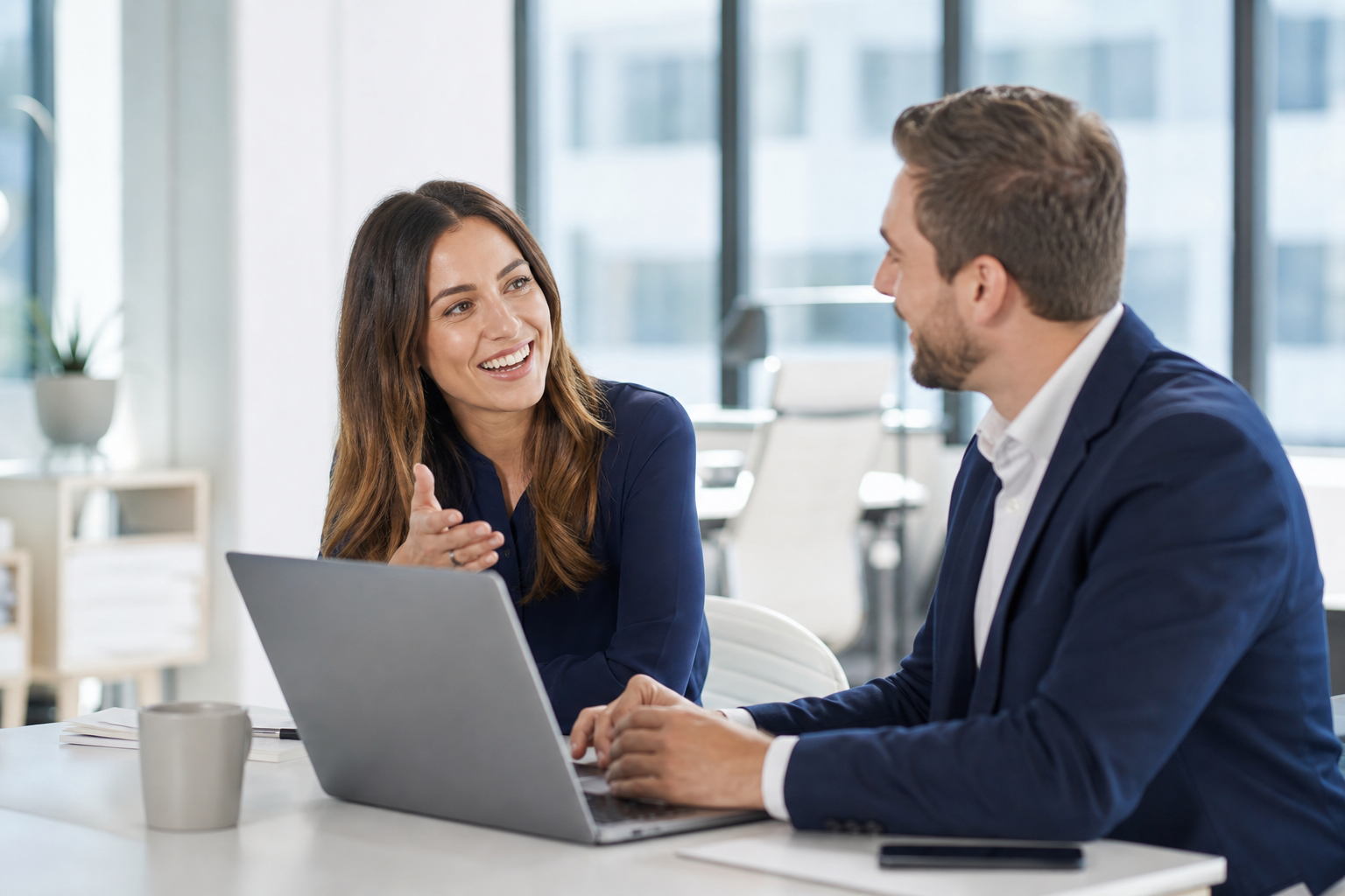 Small business sales team collaborating in a modern office
